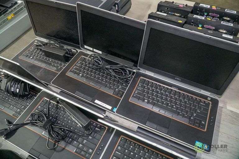 (8) Dell Latitude Laptops Roller Auctions