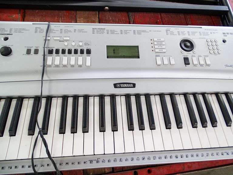 Yamaha DGX230 Portable Grand Keyboard with Stand Roller Auctions