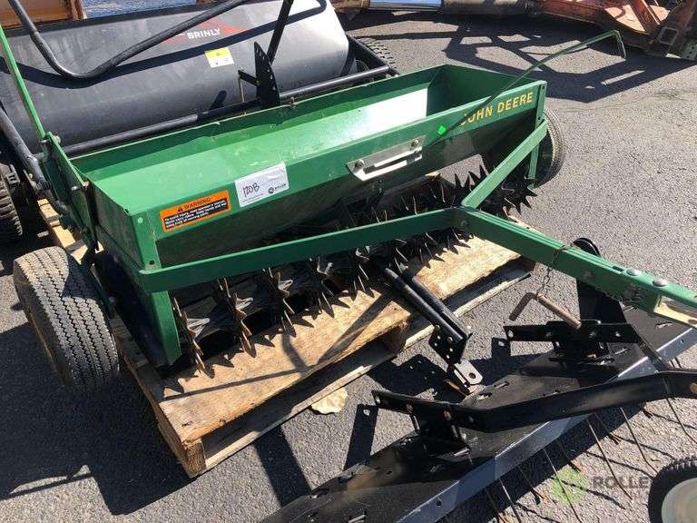 John Deere Pull Behind Seeder, Brinly Sweeper and Pull Behind Lawn Rake