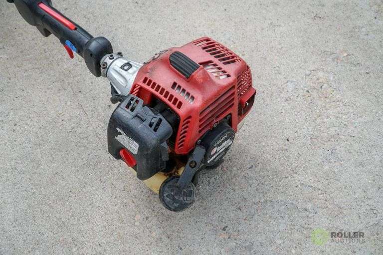 Redmax GZ30N Line Trimmer, Gas Roller Auctions
