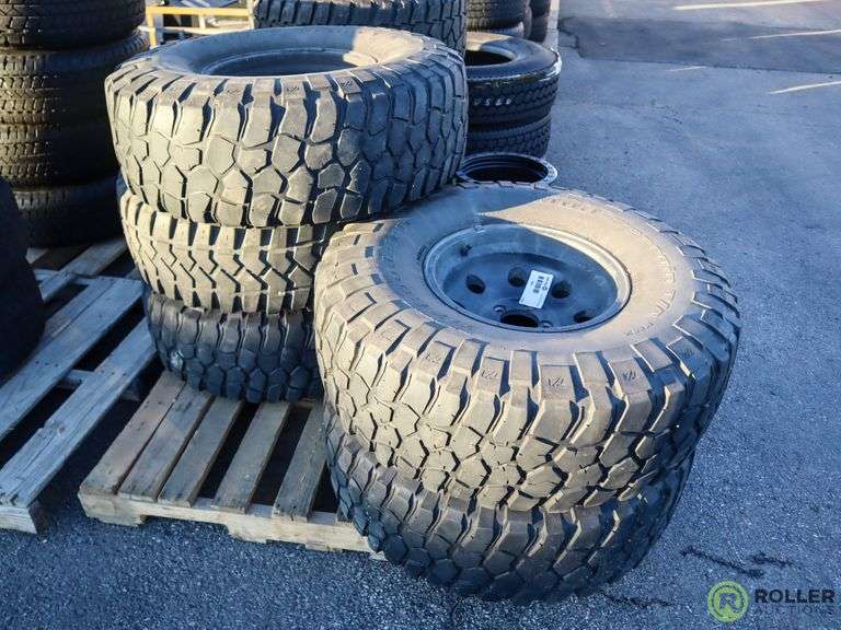 (5) BF Goodrich Mud Terrain 35X1250R15LT Tires With Wheels Roller