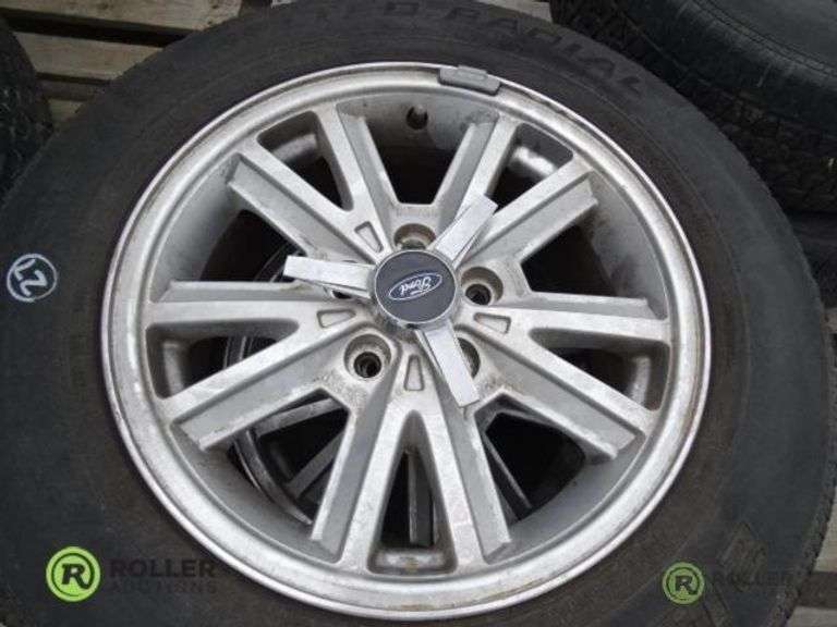 (2) Kelly and (2) Kumho 215/65R16 Tires With 5-Lug Rims - Roller Auctions