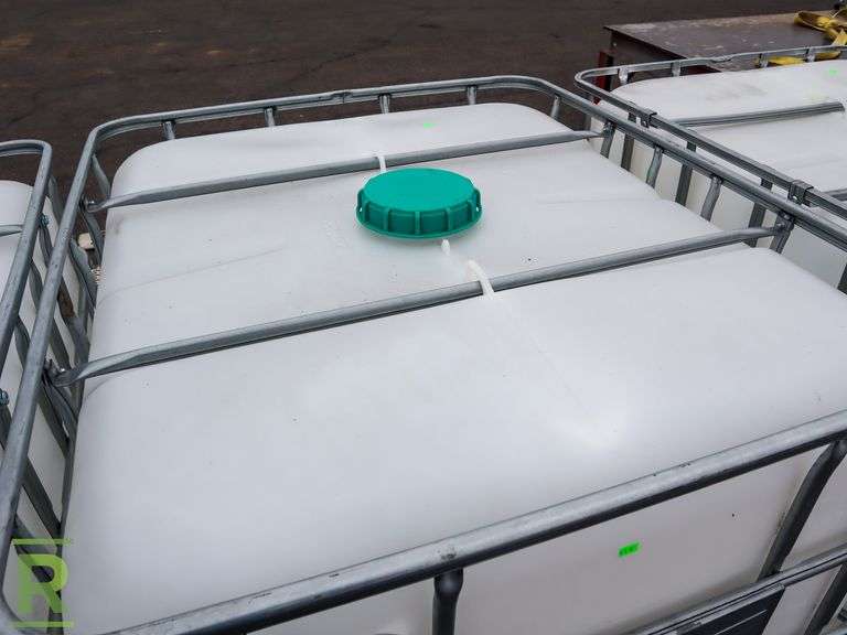 (2) 275 Gallon Plastic Tote With Enclosure, 1- Time Use, Food Grade, Tripple Rinsed, Euro Valve with Spout - Roller Auctions