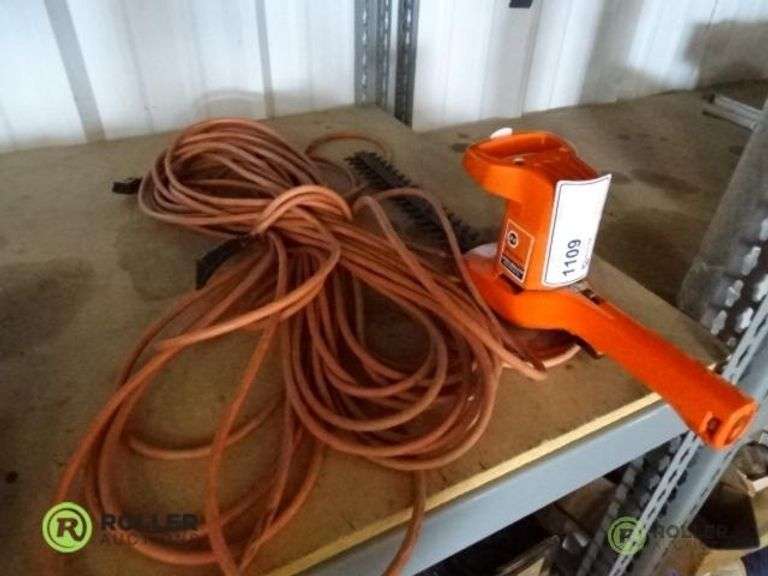 Black & Decker Hedge Trimmer and Extension Cord Roller Auctions