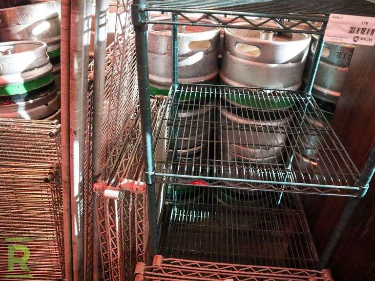 6-Tier Wire Rack With Assorted Shelves And Poles - Roller Auctions