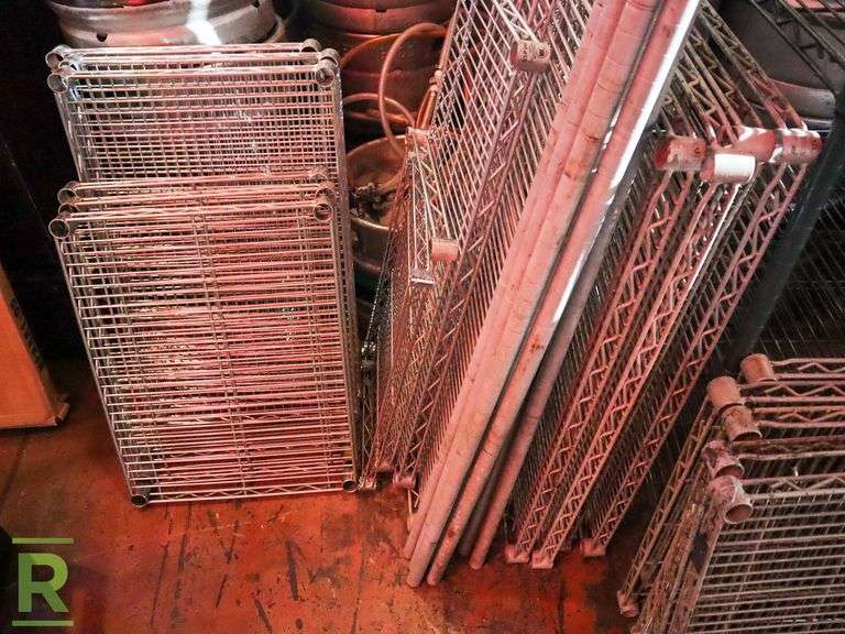6-Tier Wire Rack With Assorted Shelves And Poles - Roller Auctions