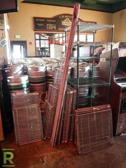 6-Tier Wire Rack With Assorted Shelves And Poles - Roller Auctions