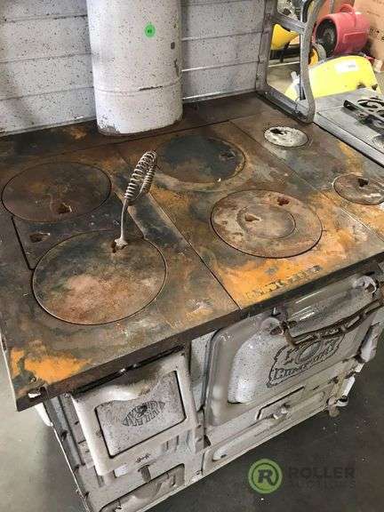 Wrought Iron Range Co. Home Comfort Stove - Roller Auctions