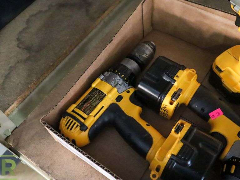 (2) DeWalt DC980 and DC940 Cordless Drills, (2) Batteries and (2