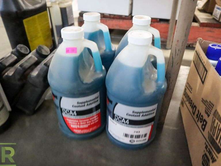 (4) 64oz Bottles of Fleetguard DCA4 Supplemental Coolant Additive