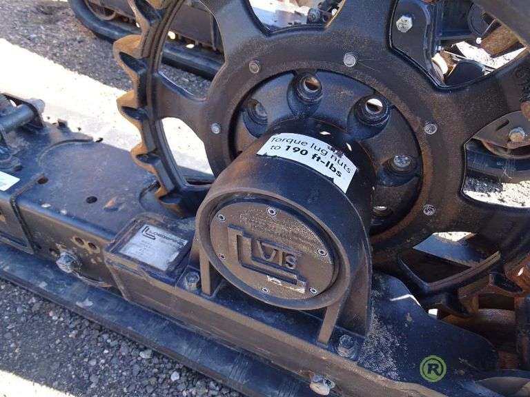 Loegering VTS54R Set of Skid Steer Tracks, Used Twice, Adjustable and Bolts on to Most Skid