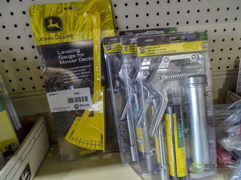 (4) John Deere TY26200 Grease Gun Kits and AMI30907 Leveling Gauge for