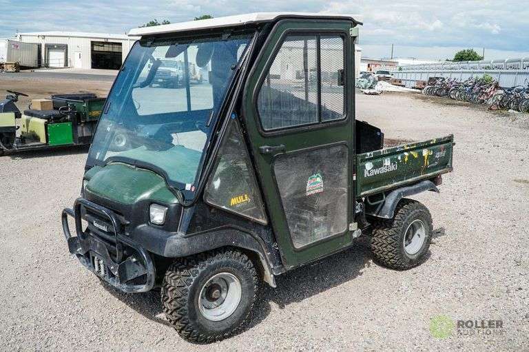 Kawasaki Mule 3010 4WD Truckster, Enclosed Cab, Gas Engine, Manual Dump