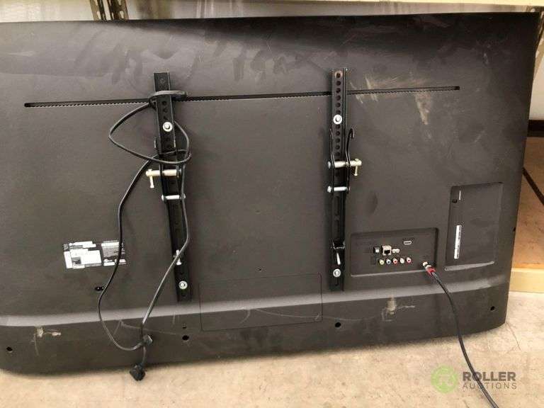LG 49UJ6300 49in TV With Wall Mount Roller Auction