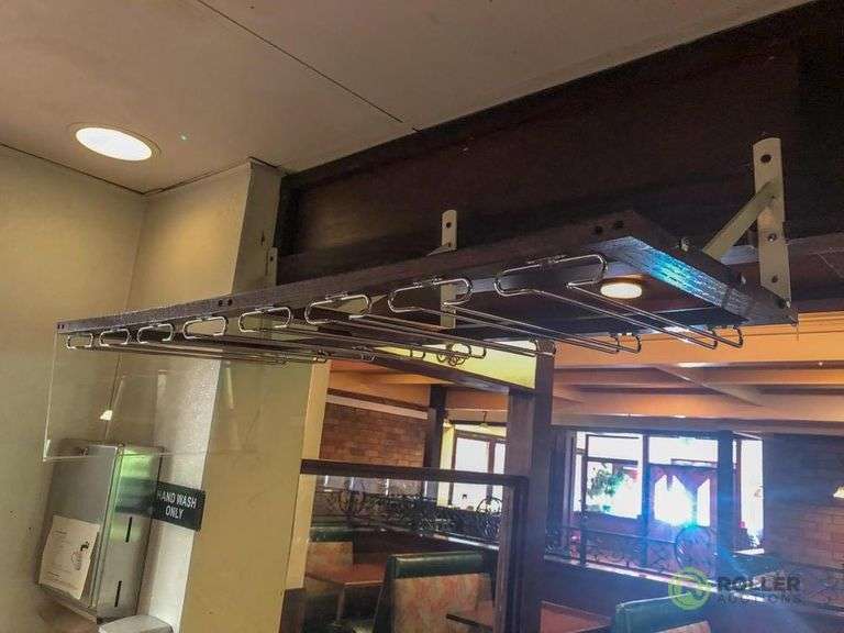 (3) Over Bar Glass Racks Roller Auctions
