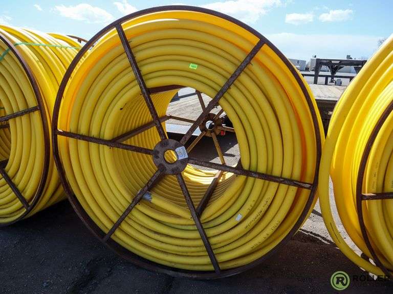 Spool of 2" Yellow Poly Pipe Roller Auctions
