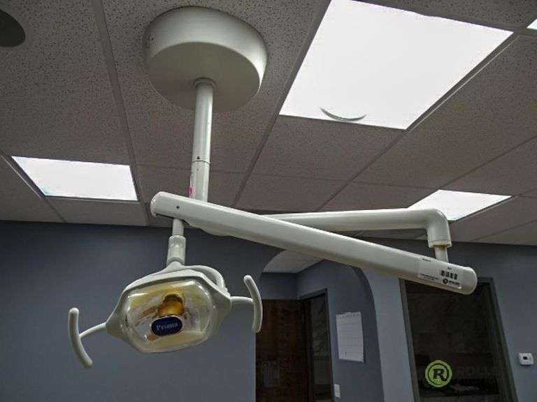 Proma Adjustable Dental Light With Ceiling Mount Roller Auctions