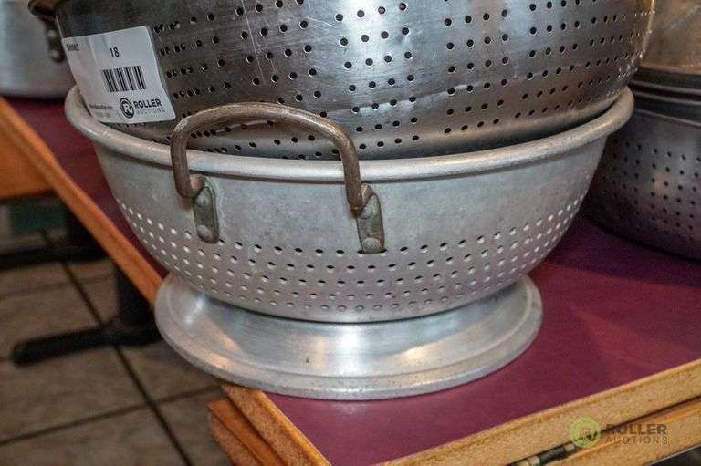 (8) Stainless Steel Colanders, Mixing Bowl and (2) Strainers Roller