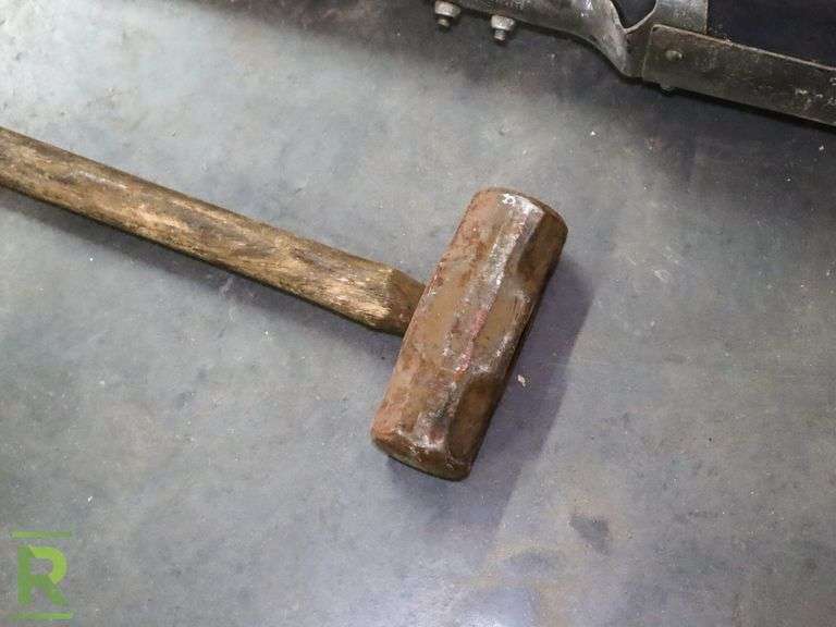 Sledge Hammer and Rock Rive Post Hole Digger Roller Auctions