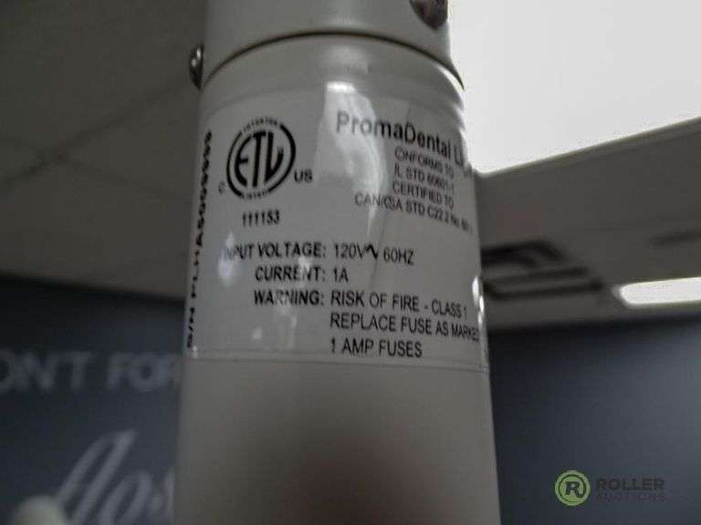 Proma Adjustable Dental Light With Ceiling Mount Roller Auctions