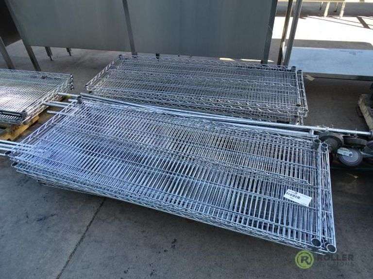 Pallet of Wire Rack Parts With (13) Shelves and (12) Poles Roller
