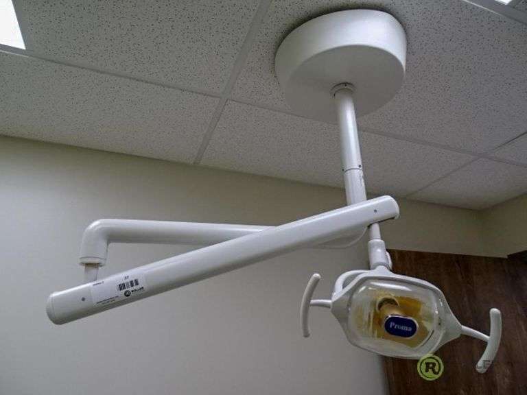 Proma Adjustable Dental Light With Ceiling Mount Roller Auctions