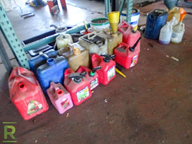 Assorted Gas Cans and Oil Cans Roller Auctions