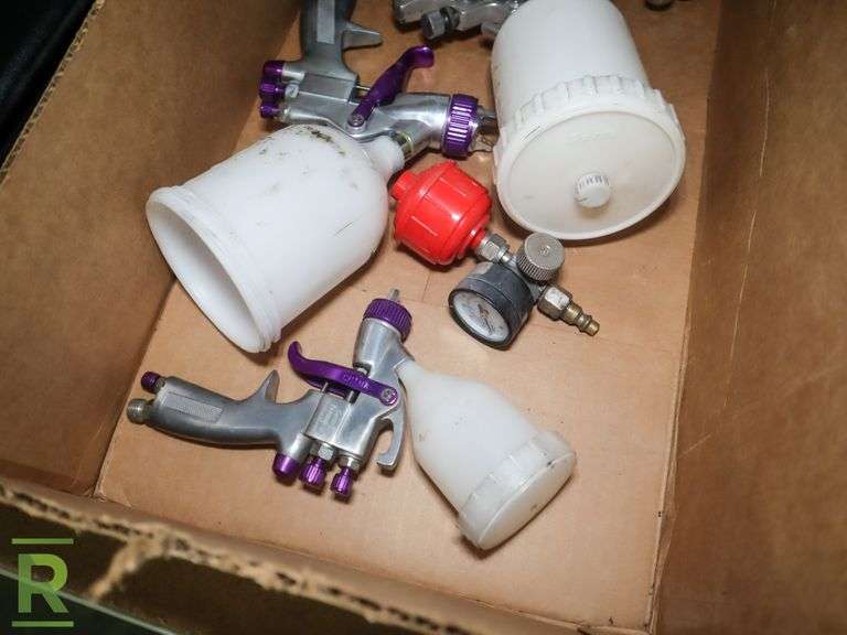 Krause and Becker Airless Paint Sprayer With Tray of Paint Guns