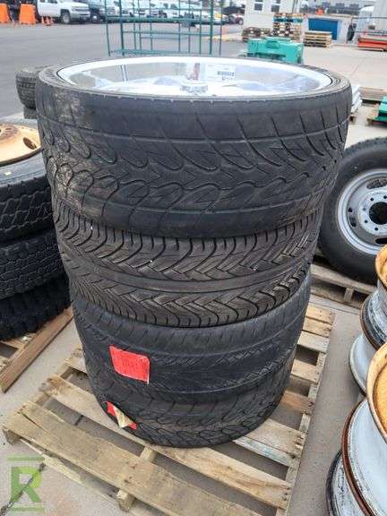 (4) 26" VCT Wheels and (2) 2012 Lionhart LH-008, (1) 2011 Lexani LX-30 and (1) 2012 Sunny SN3870 295/30R26 Tires - Roller Auctions