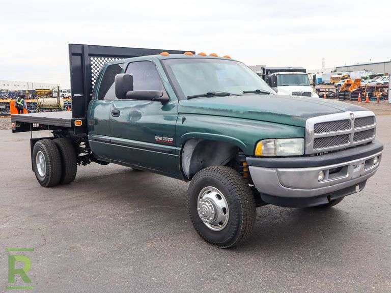 2002 Dodge Ram 3500 Laramie SLT 4WD Quad Cab Flatbed Truck - Roller Auctions