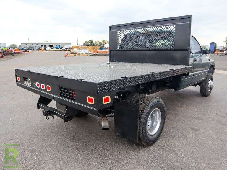 2002 Dodge Ram 3500 Laramie SLT 4WD Quad Cab Flatbed Truck - Roller Auctions