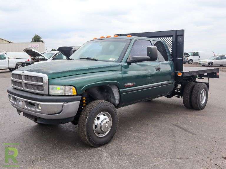 2002 Dodge Ram 3500 Laramie SLT 4WD Quad Cab Flatbed Truck - Roller Auctions