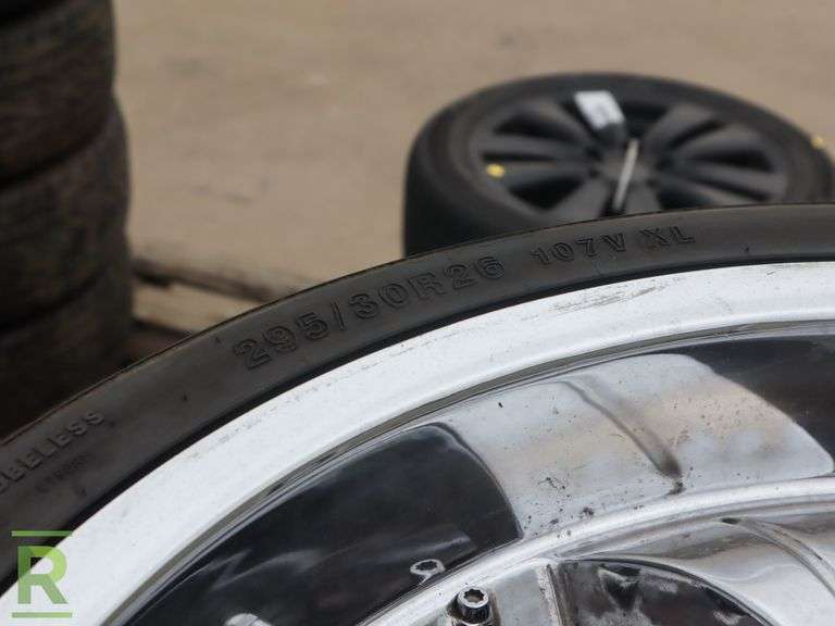(4) 26" VCT Wheels and (2) 2012 Lionhart LH-008, (1) 2011 Lexani LX-30 and (1) 2012 Sunny SN3870 295/30R26 Tires - Roller Auctions