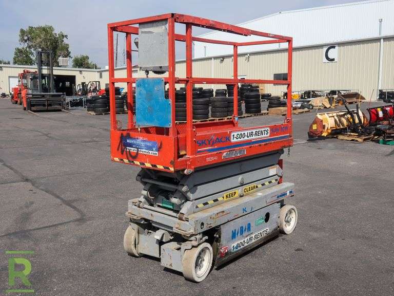SkyJack 3219 Electric Scissor Lift, 64" x 24" Deck, 36" Extension, 19' Max Platform Height