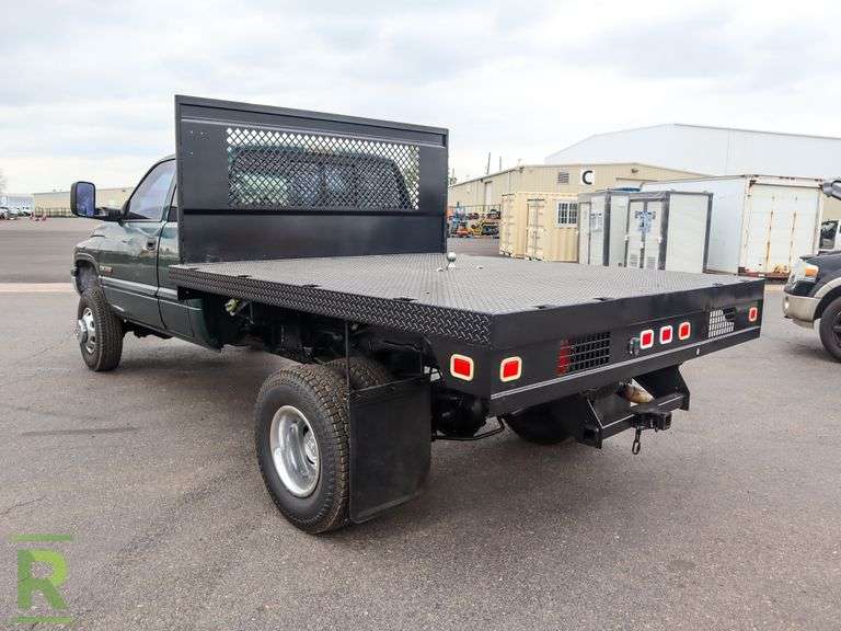 2002 Dodge Ram 3500 Laramie SLT 4WD Quad Cab Flatbed Truck - Roller Auctions