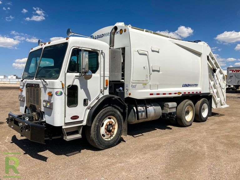 2014 Peterbilt 320 T/A Trash Truck Roller Auctions