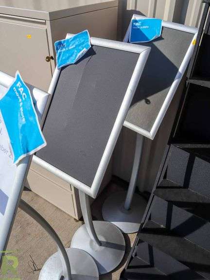(3) Sign Holders - Roller Auctions