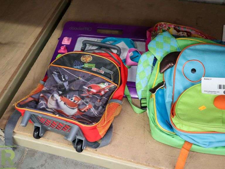 Shelf Of Books, Backpacks, Games - Roller Auctions