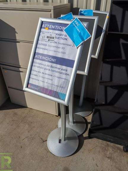 (3) Sign Holders - Roller Auctions