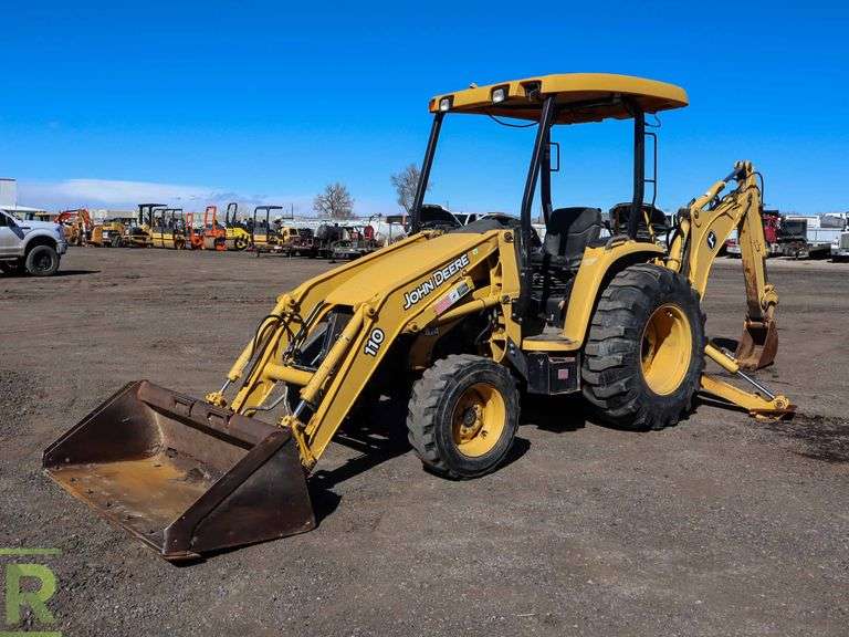 John Deere 110 4WD Loader/Backhoe Roller Auctions