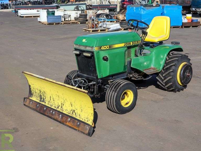John Deere 400 Lawn Tractor, 23 HP, 54” Snow Plow, Gas Roller Auctions