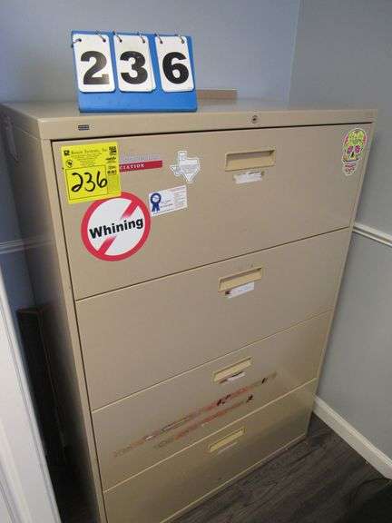 TWO DRAWER METAL FILE CABINET FOUR DRAWER METAL FILE CABINET **Located