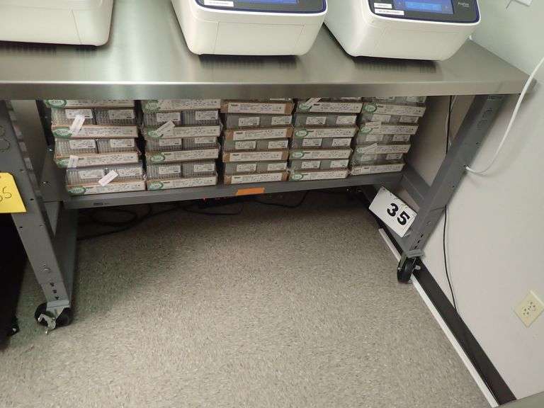 ULINE ADJUSTABLE HEIGHT ROLLING TABLE W/ STAINLESS STEEL TOP 5' X 2'6