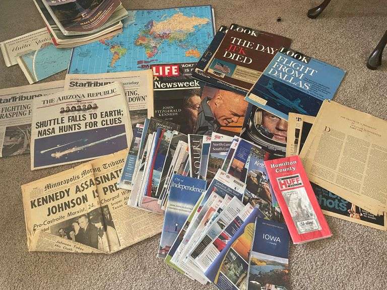 Variety of Maps and Collectible Newspapers reSettled Life