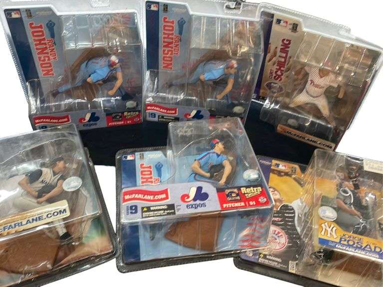 Variety of Sports Collectible Figurines reSettled Life