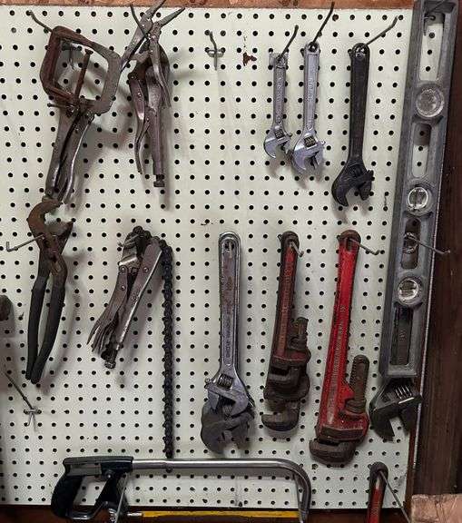 Crescent wrenches, pipe wrenches, channel locks, mallets, pry bar and