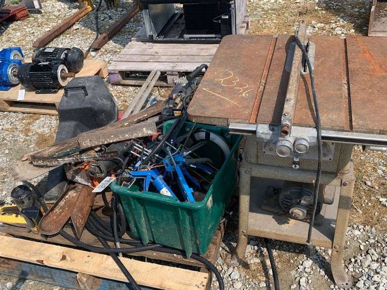 Pallet of garden tools, air compressor, caulking guns, table saw