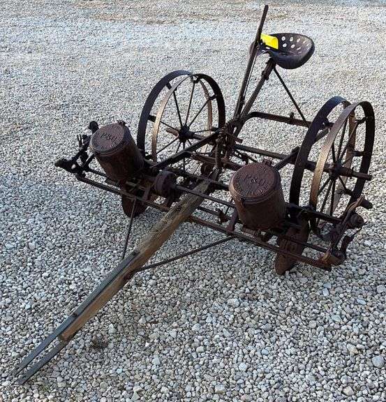 Antique horse drawn P&O corn planter Schneider Auctioneers LLC