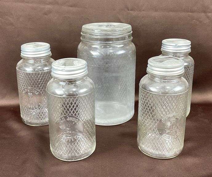 5 antique Old Judge coffee jars Schneider Auctioneers LLC