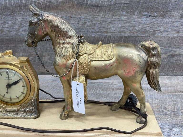 Vintage United metal horse clocknon working Schneider Auctioneers LLC
